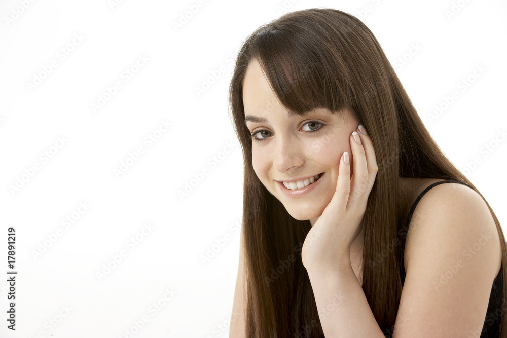 Studio Portrait Of Teenage Girl On White Background Studio Portrait Of Teenage Girl On White Background