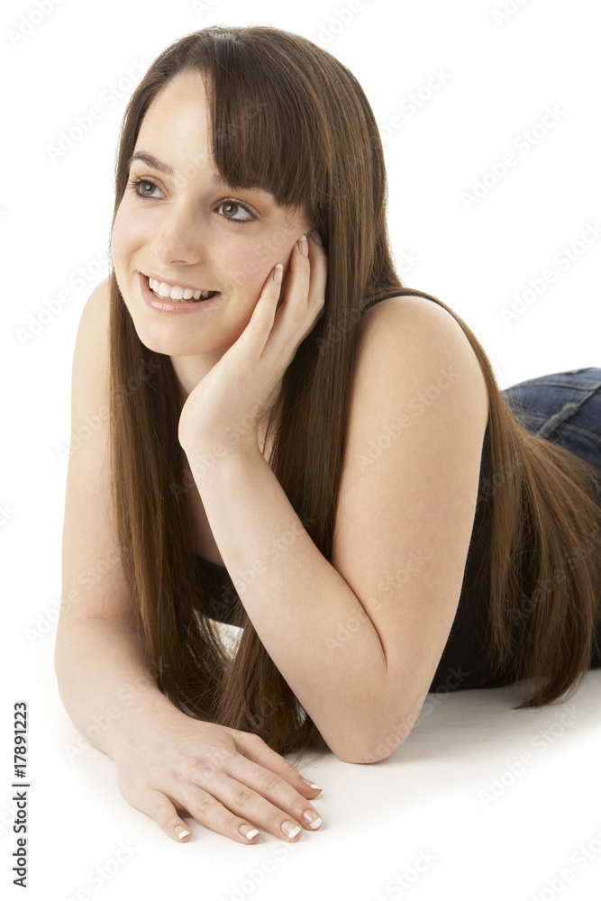 Studio Portrait Of Teenage Girl On White Background Studio Portrait Of Teenage Girl On White Background
