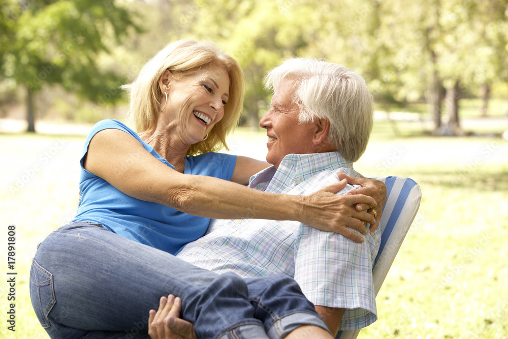 Fototapeta premium Portrait Of Senior Couple Enjoying Day In Park
