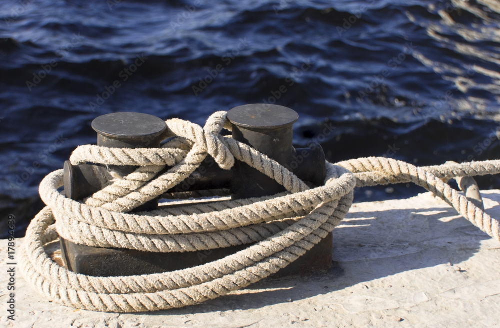 Fototapeta premium boats and docks to which ropes are tied