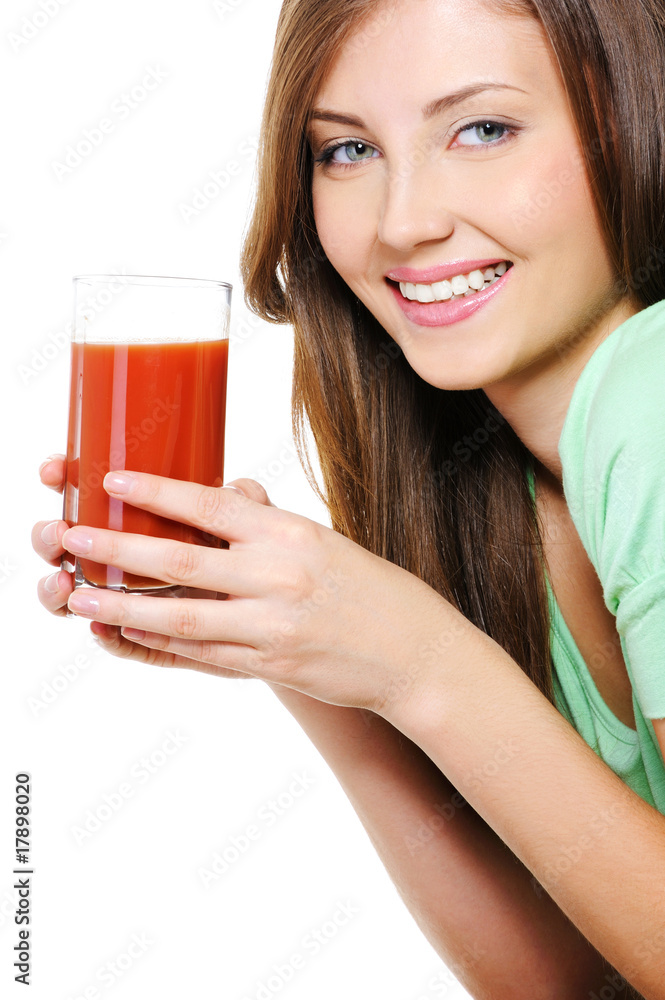 Beautiful young woman with a glass of tomato juice Beautiful young woman with a glass of tomato juice