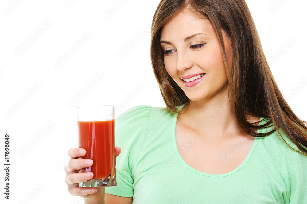 Young femlae with a glass of tomato juice Young femlae with a glass of tomato juice