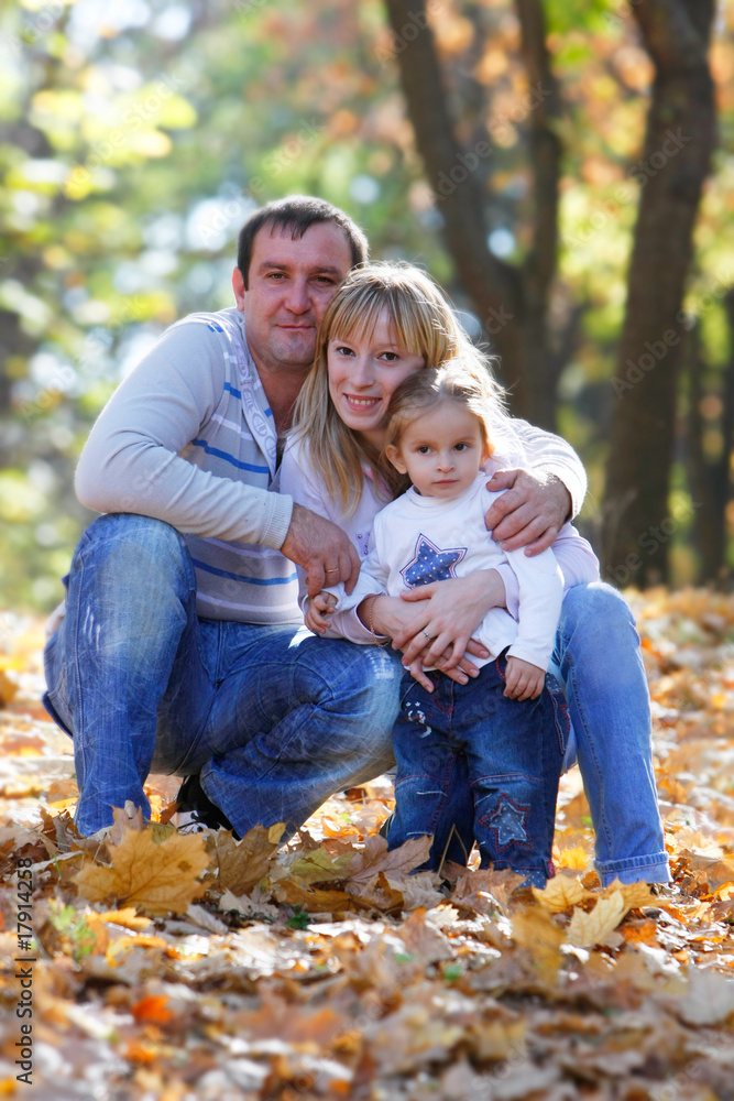 Fototapeta premium happy family in autumn park