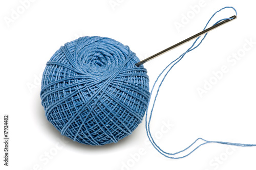 Blue spool of the threads with needle