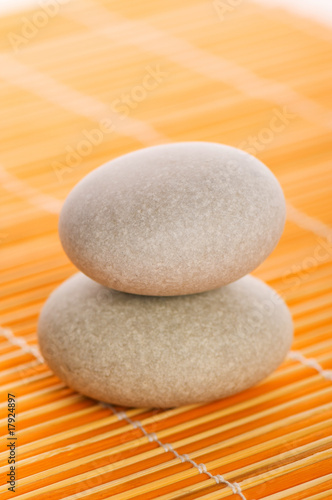 Stack of spa pebbles against blurred background