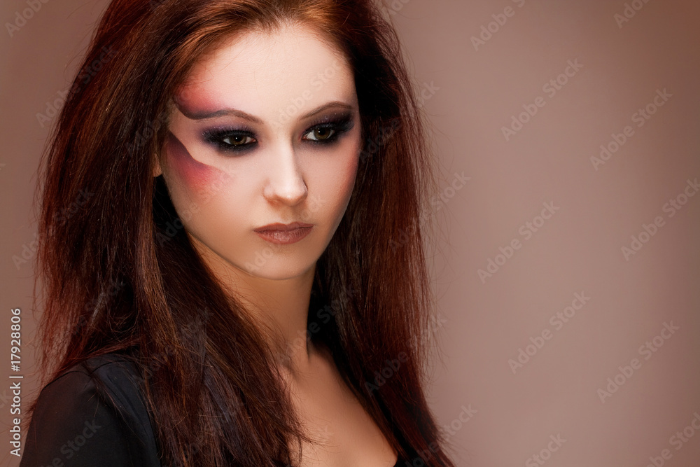 Fototapeta premium young beautiful brunette woman with artistic makeup
