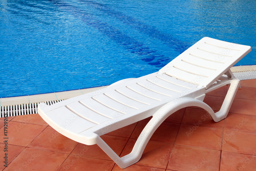 relax chair near the pool relax chair near the pool
