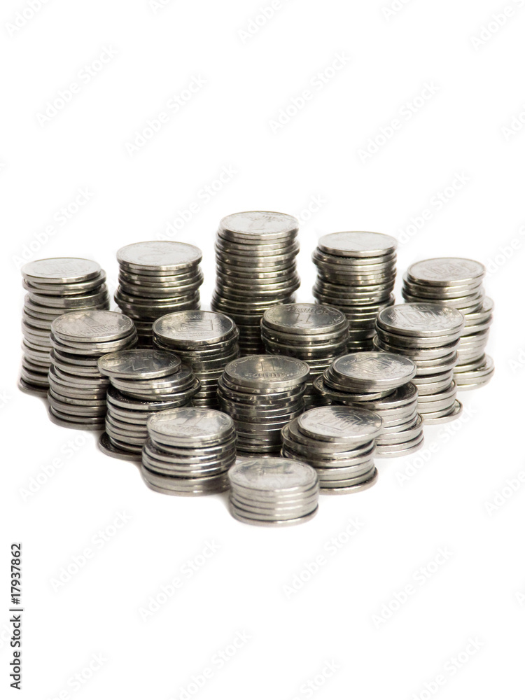 Stacks of silver coins, isolated over white background. Stacks of silver coins, isolated over white background.