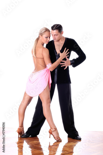 dancers in ballroom against white background