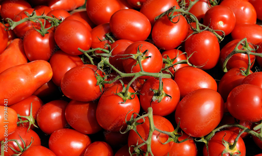 many red tomatoes - vegetable market