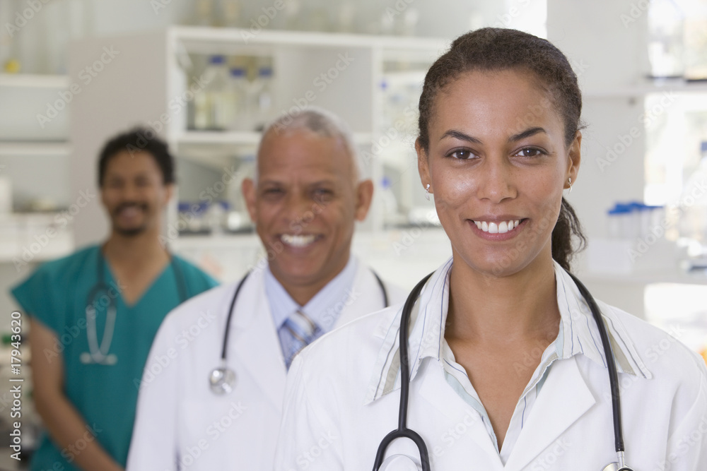 Smiling doctors in hospital laboratory Smiling doctors in hospital laboratory