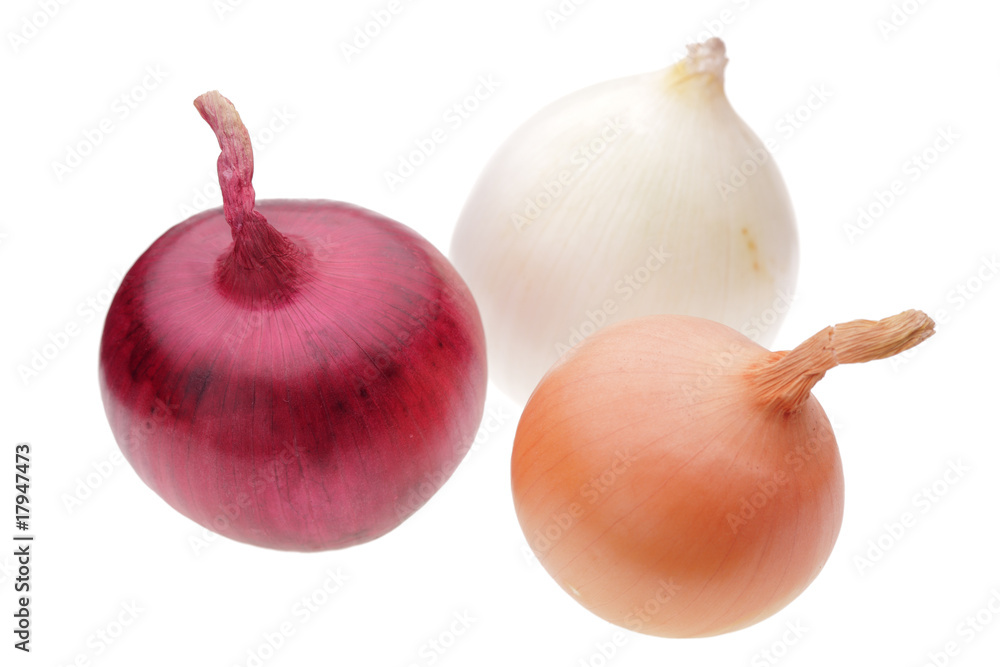 three onion bulbs isolated on white