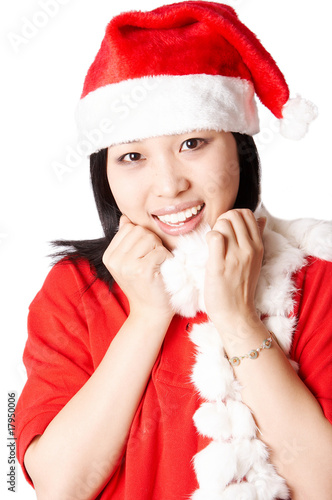 Happy asian Santa Claus woman