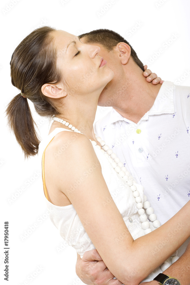 Naklejka premium Man kisses young woman