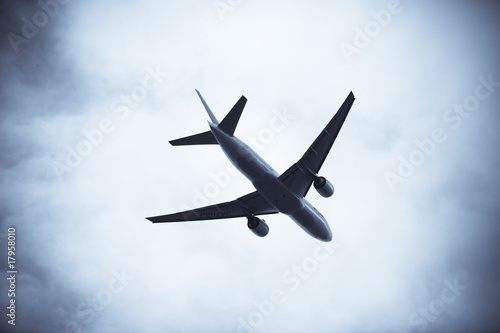 the airplane with the blue sky background.