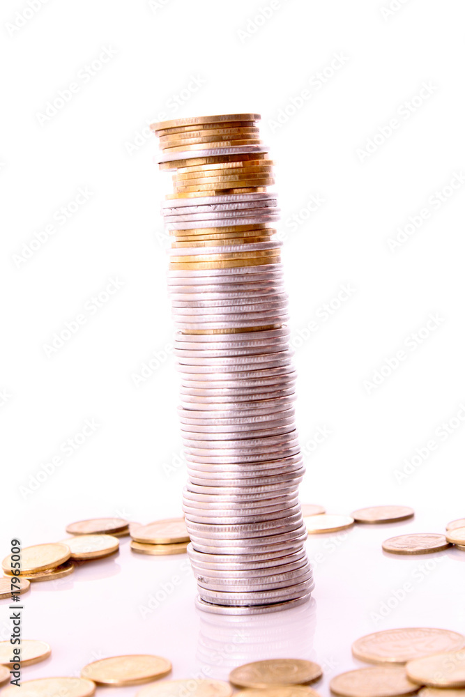Tower with coins isolated on white Tower with coins isolated on white