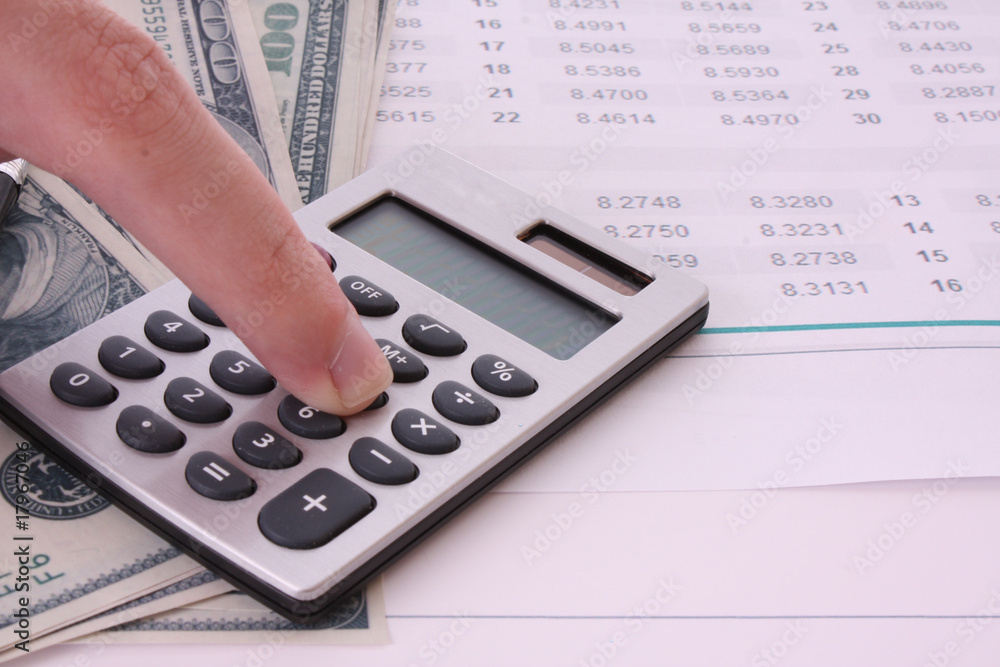 Some financial things - calculator, money, digits, charts Some financial things - calculator, money, digits, charts