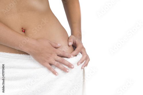 Woman with spa towel around waist © Tandem