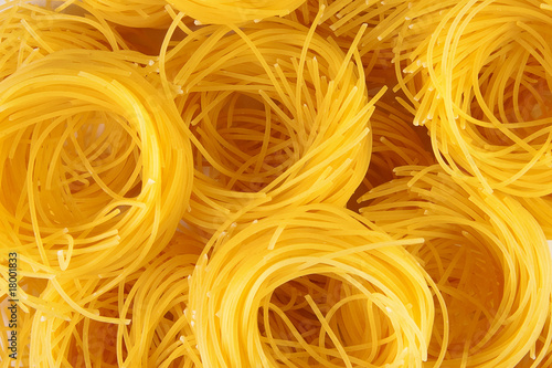 Italian pasta as background.