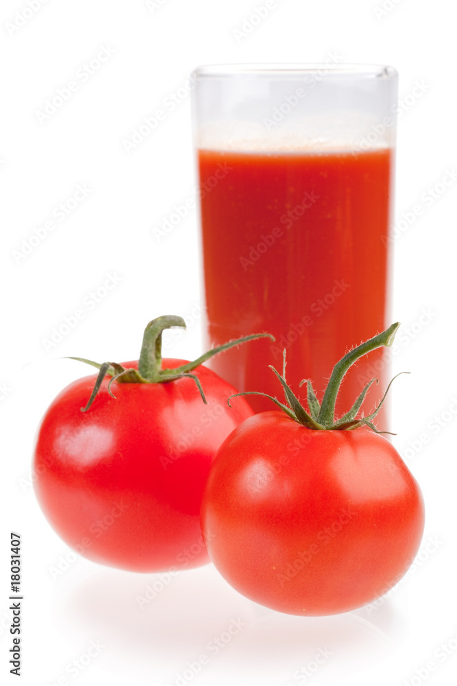 Ripe red tomatoes and glass of tomato juice. Ripe red tomatoes and glass of tomato juice.