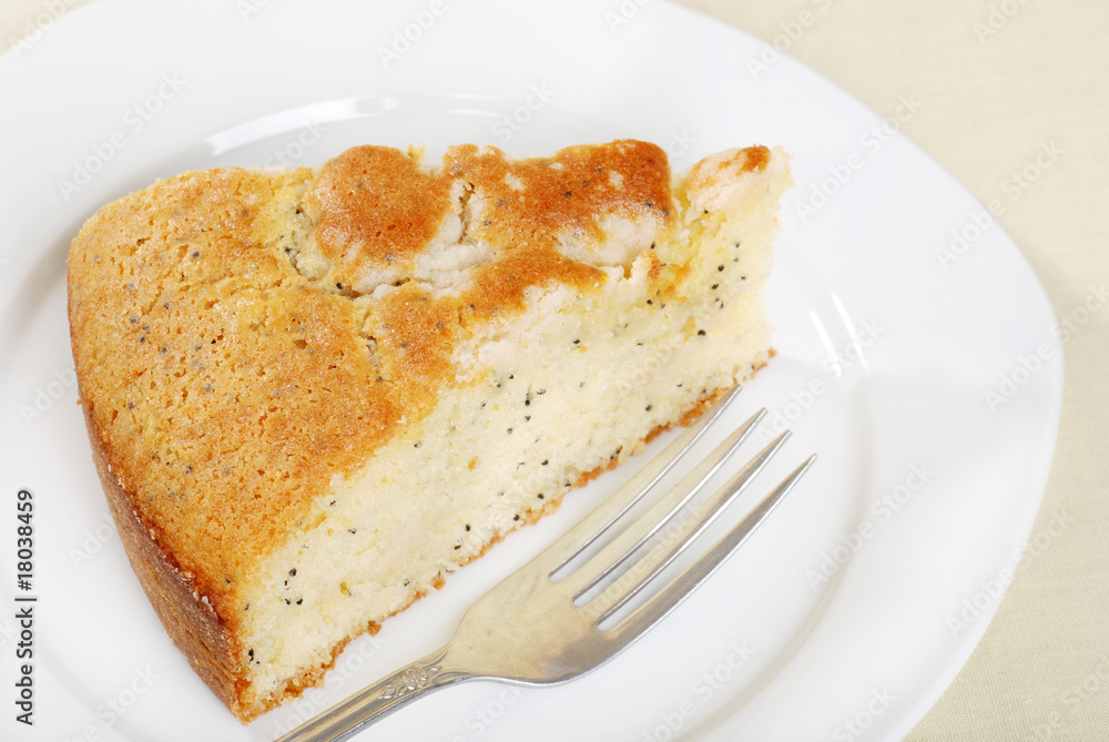 slice lemon poppy seed cake on a plate slice lemon poppy seed cake on a plate