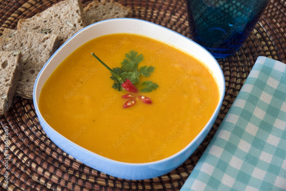 Orange soup served with bread Orange soup served with bread