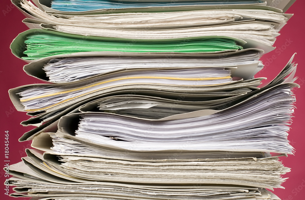 Finance documents on red background Finance documents on red background