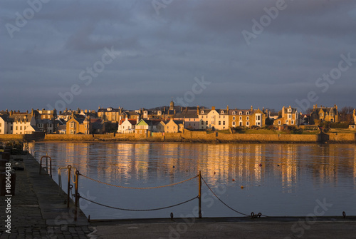 Warm sunset on seafront of Elie, East Neuk, Fife, Scotland. photo