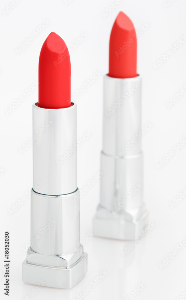 Two red lipsticks isolated on white Two red lipsticks isolated on white