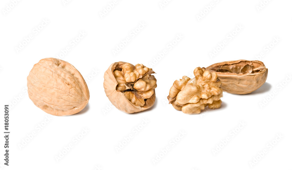 Cracked walnuts isolated on white background Cracked walnuts isolated on white background