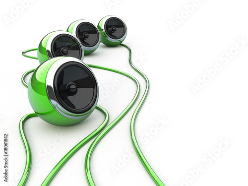 Green speakers isoltaed over white
