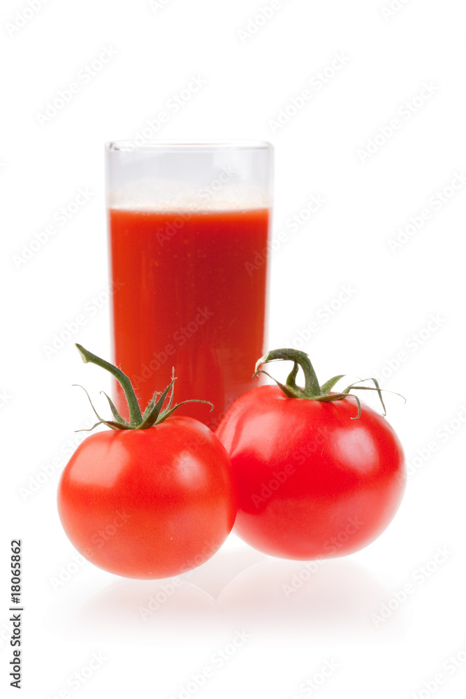 Ripe red tomatoes and glass of tomato juice. Ripe red tomatoes and glass of tomato juice.