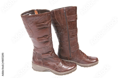 Elegance, brown modern boots on a white