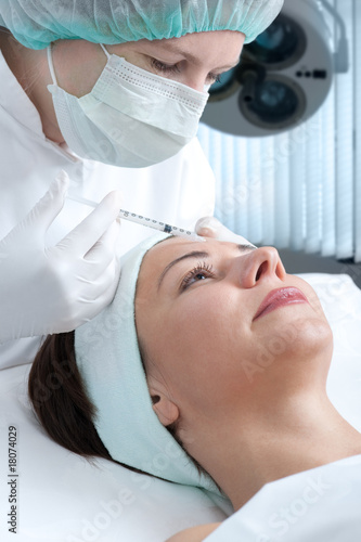 Woman receiving cosmetic injection