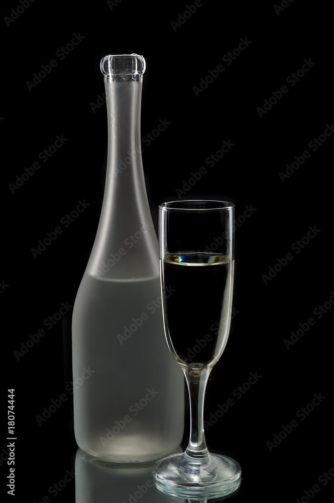 Wine bottle and glass