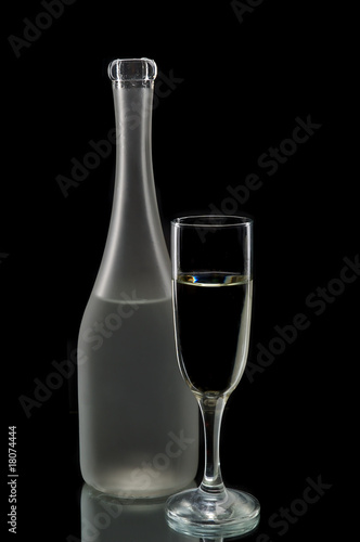 Wine bottle and glass