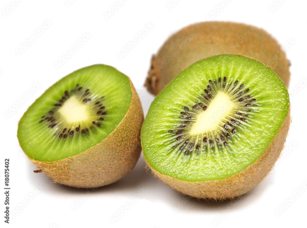Kiwi with slices isolated on white Kiwi with slices isolated on white