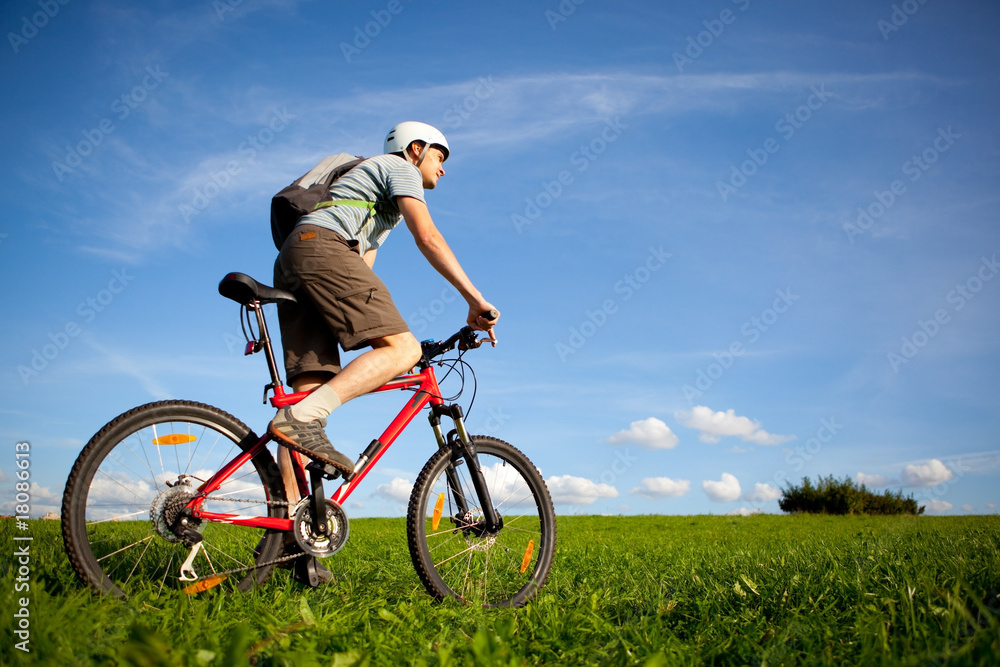 Men on mountain bike.