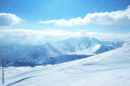 Fototapeta Naklejka Na Ścianę i Meble -  High mountains under snow in the winter