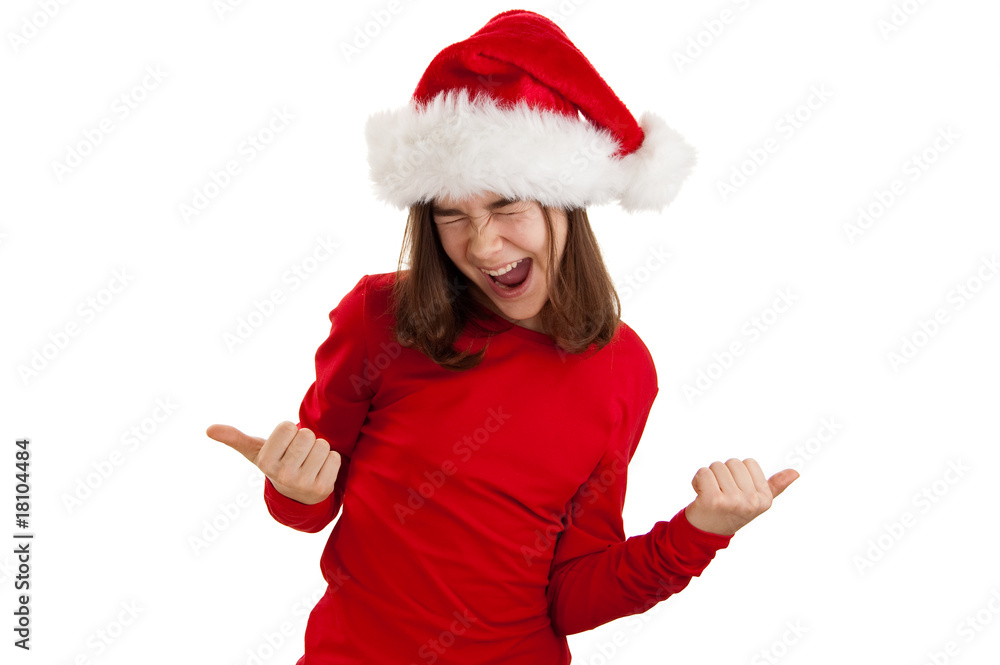 Girl in Santa's hat showing OK sign isolated on white Girl in Santa's hat showing OK sign isolated on white