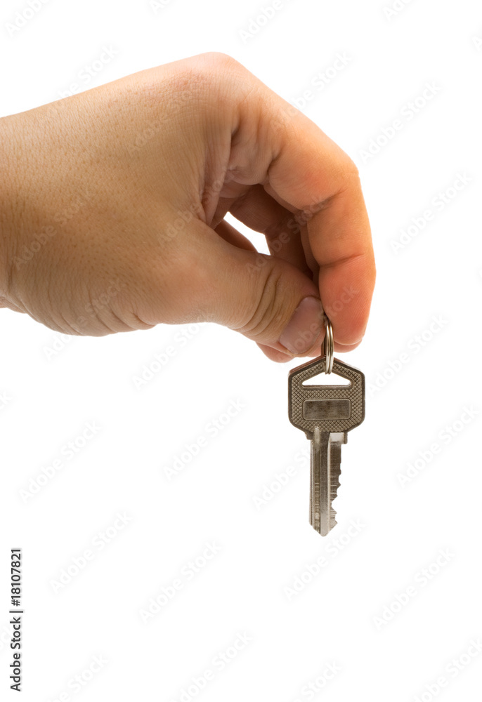Hand with keys in it isolated over white Hand with keys in it isolated over white
