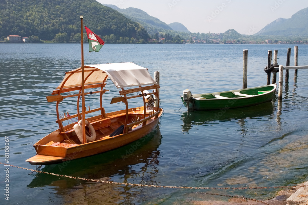 Wooden boats on Maggore lake, Ticino, Switzerland.