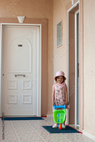 Wallpaper Mural Girl and toy wheelbarrow Torontodigital.ca