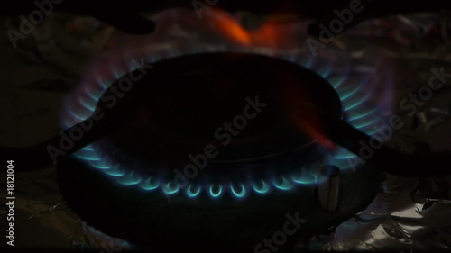 A cooking stove is firing, gas cooker, heat, high angle photo