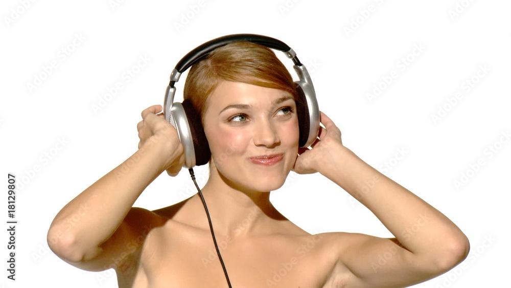 Portrait of beautiful and sexy woman dancing in headphones Portrait of beautiful and sexy woman dancing in headphones