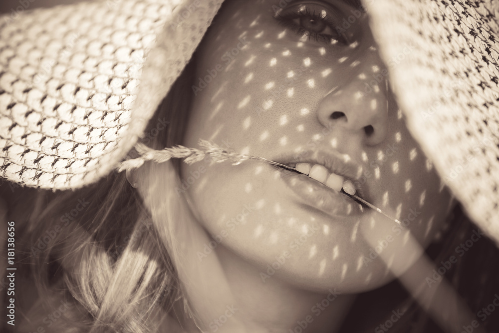 Young woman in a hat portrait Young woman in a hat portrait