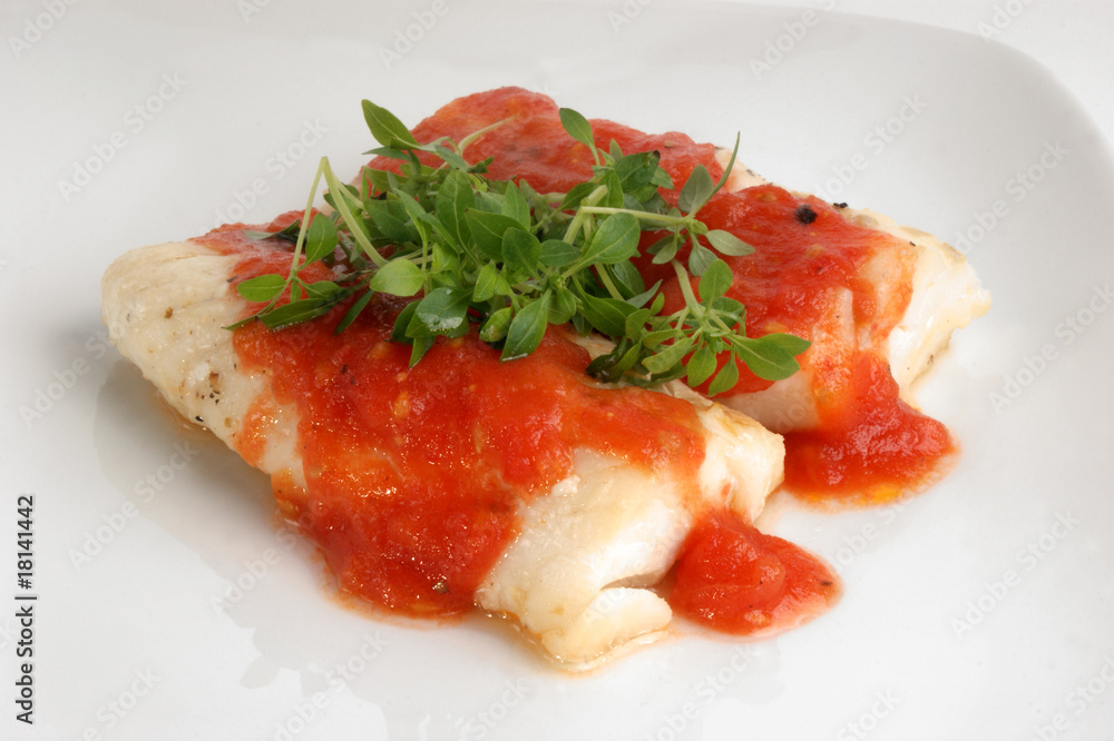 Fotografie cooked cod loins with home made tomato sauce