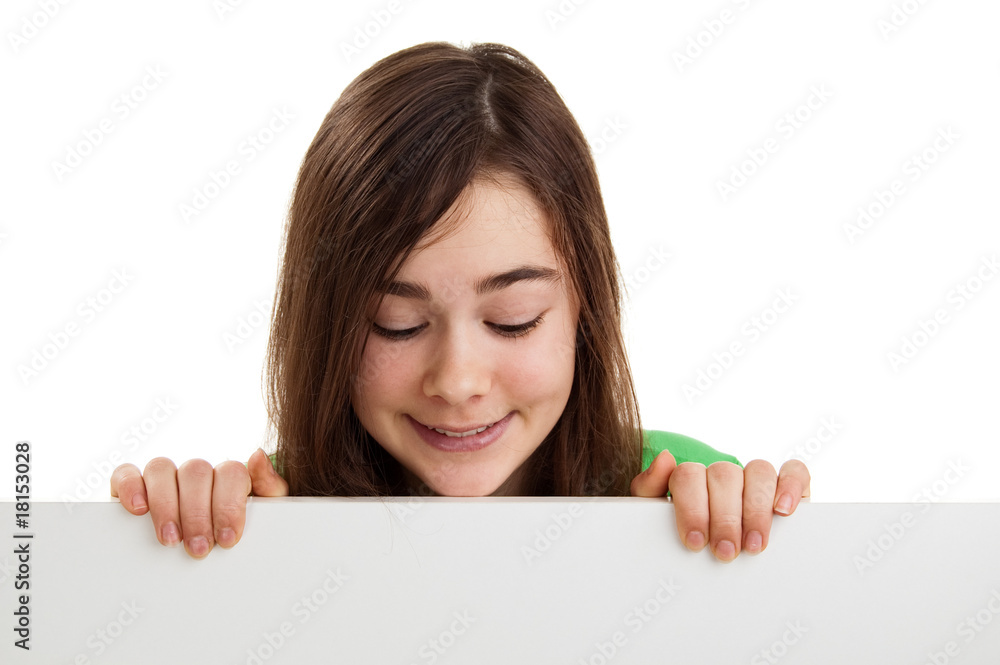 Girl behind empty board isolated on white background Girl behind empty board isolated on white background