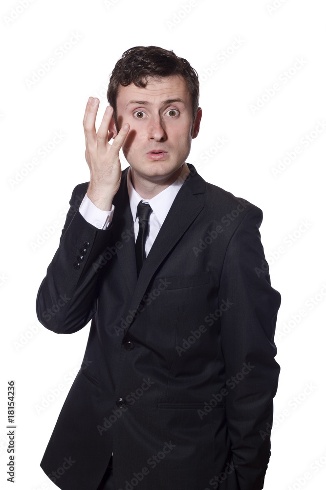 baffled businessman scratching his head baffled businessman scratching his head
