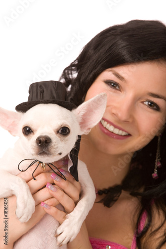 portrait of a young brunette woman with dog